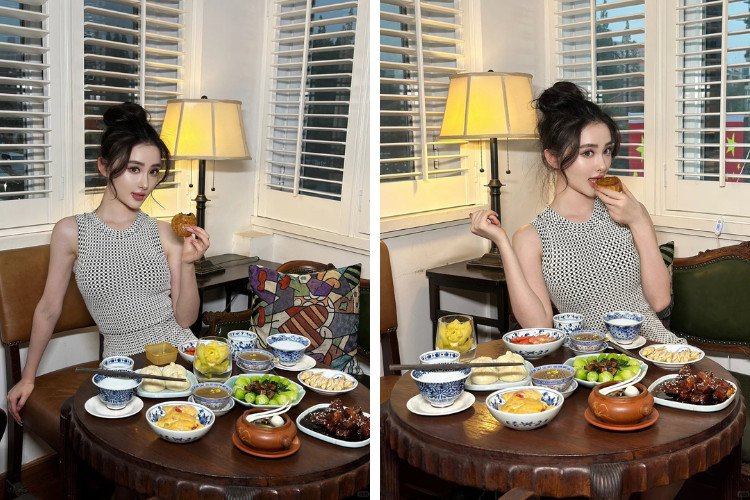 Tạo dáng chụp ảnh với bánh Trung thu Tạo dáng chụp ảnh với bánh Trung thu