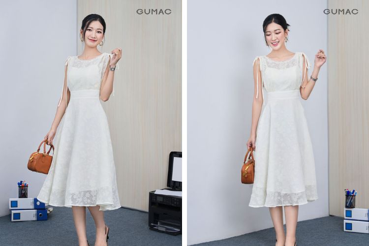 Váy đầm công sở màu be rút dây phối với giày mũi nhọn trắng.