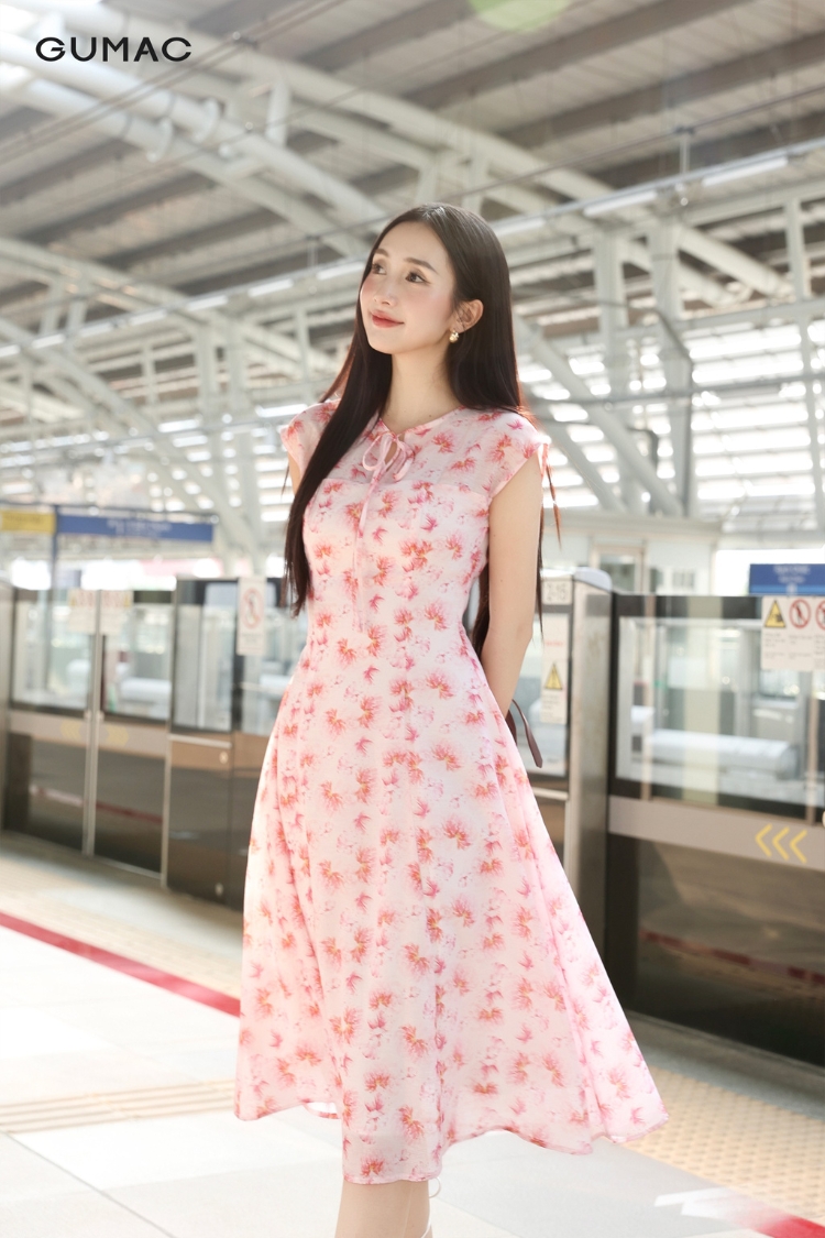 Váy chữ A có họa tiết thắt nơ