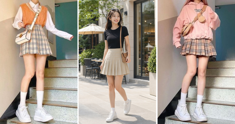 Giày sneaker trắng diện cùng váy xếp ly ngắn.