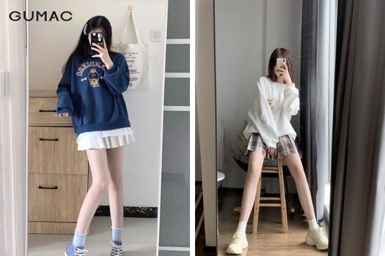 Tạo dáng tự chụp trước gương dùng điện thoại che mặt