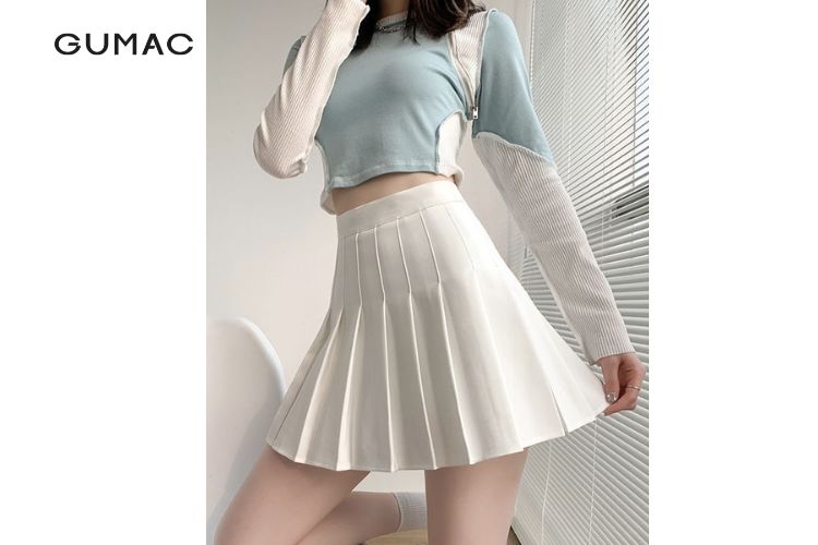 Áo croptop phối váy xếp ly ngắn cá tính