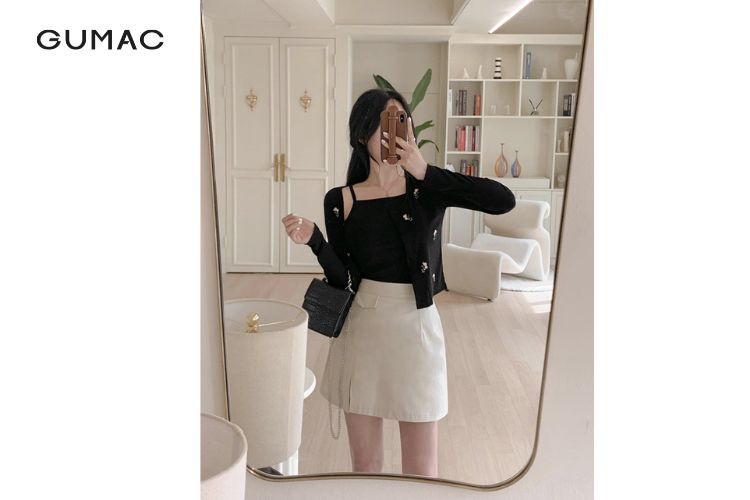Diện áo hai dây cùng cardigan và chân váy chữ A duyên dáng